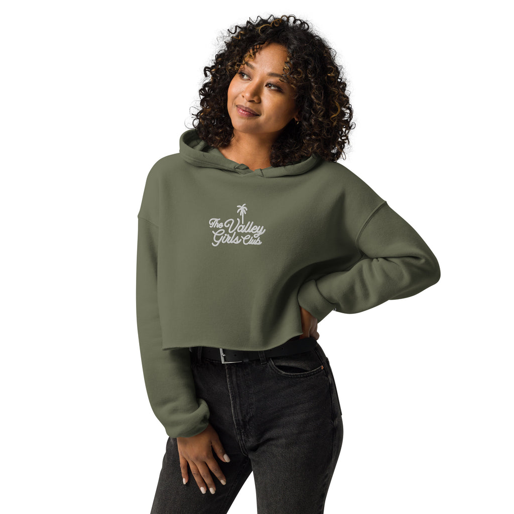 Woman wearing Valley Girls Club olive green cropped hoodie